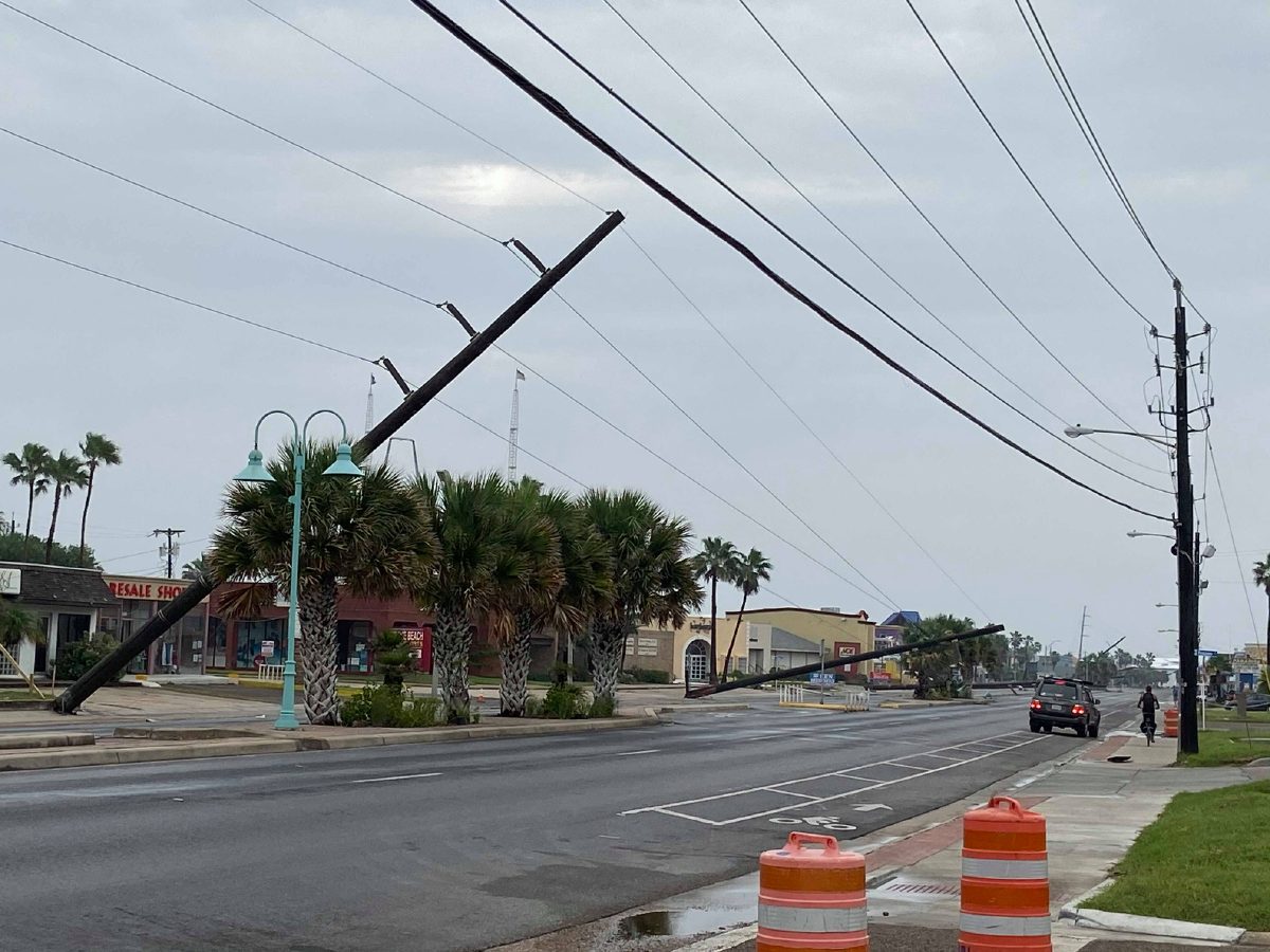 Cold front delays Island power pole repairs