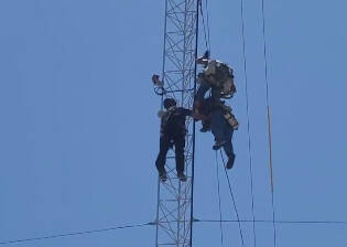 Man threatening to jump from La Feria tower rescued by firefighters ...