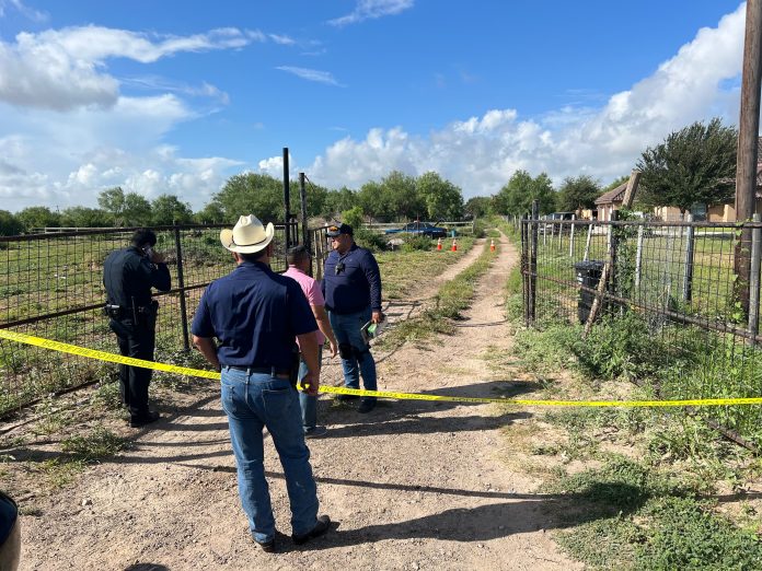 Alton police investigate a homicide at a ranch Saturday, June 18, 2022, in Alton.