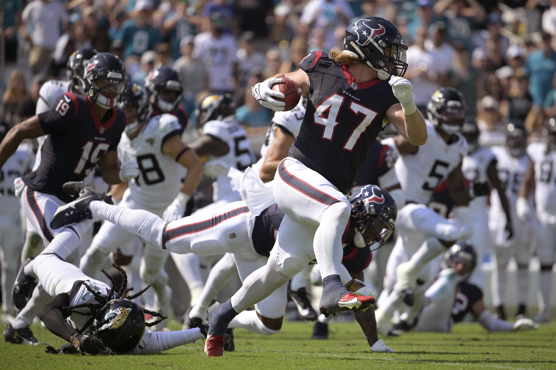 Beck's rare TD return propels Texans to a 37-17 rout of Jaguars and gives  Ryans his first win