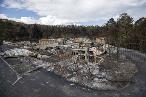 Team combs fire-ravaged New Mexico community for remains of the missing